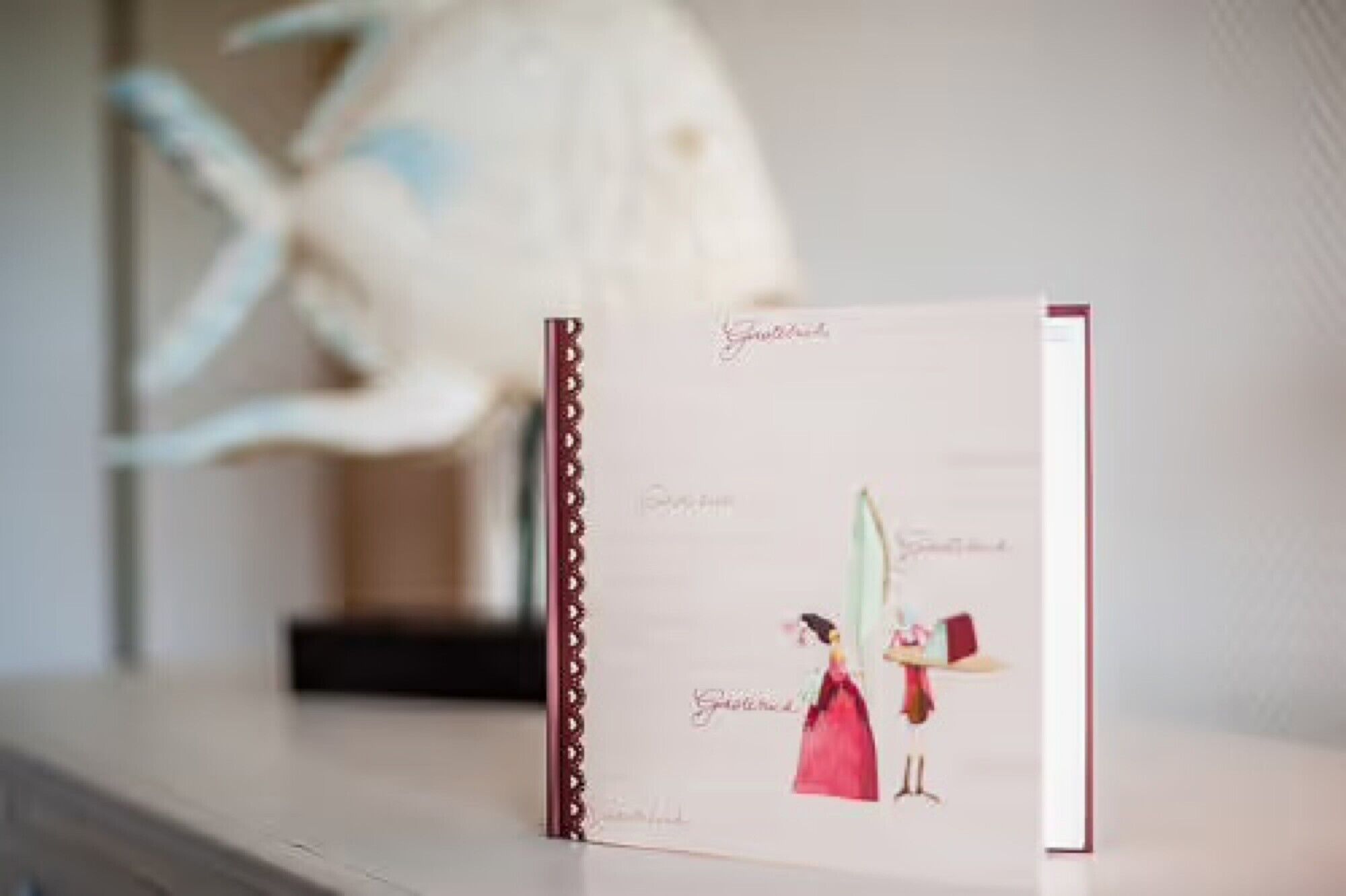 A card with a floral design and text.