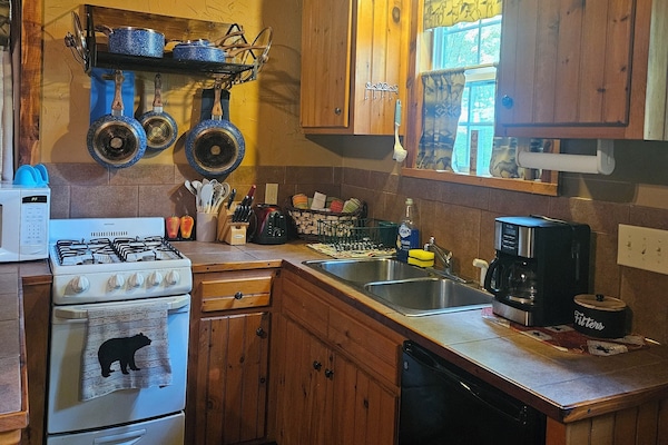 Kitchen with all the essentials. Coffee, sugar, and creamer provided.
