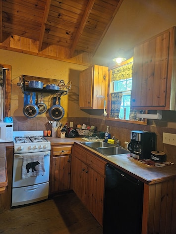 Kitchen with all the essentials. Coffee, sugar, and creamer provided.