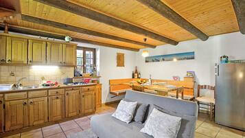 Family Chalet, 1 Bedroom, Mountainside (Rustico Ca del Pol) | Living area | Flat-screen TV, fireplace