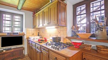 Family Chalet, Multiple Bedrooms, Mountainside (Rustico Ca del Pol) | Private kitchen | Fridge, stovetop, coffee/tea maker, cookware/dishes/utensils