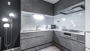 Comfort Villa | Private kitchen | Fridge, microwave, stovetop, dishwasher
