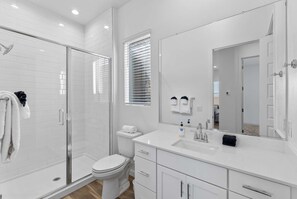 Shower, hair dryer, towels
