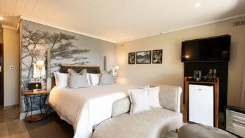 Colchones con pillow-top, minibar y caja de seguridad en la habitación