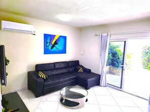 Appartement, 1 chambre, accessible aux personnes à mobilité réduite, patio | Coin séjour