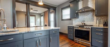 Oven, dishwasher, coffee/tea maker, cookware/dishes/utensils
