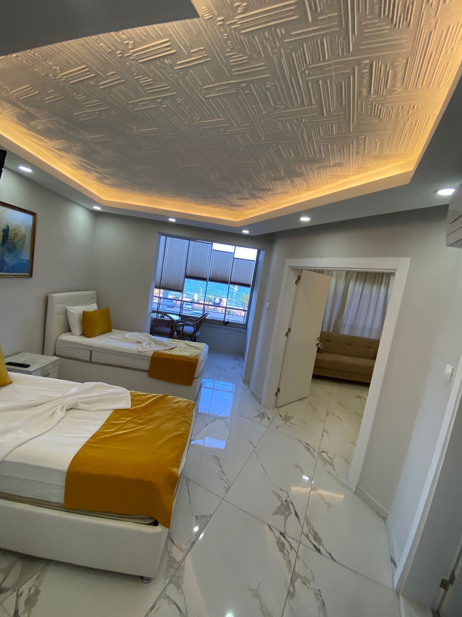 Habitación cuádruple Confort, balcón, vista a la playa | Wifi gratis 