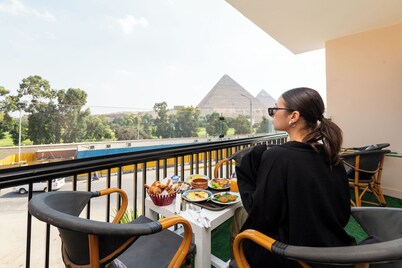 Maria Pyramids House