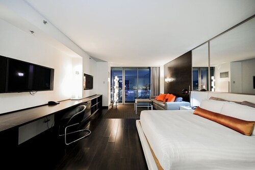 High Floor Studio Strip View w/ Open Balcony at Palms Place