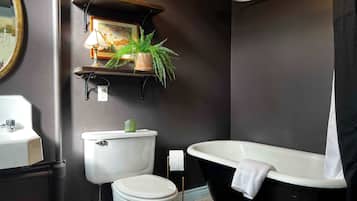 Shower, hair dryer, towels, toilet paper