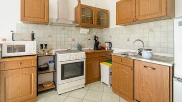 Apartment | Private kitchen | Electric kettle, high chair