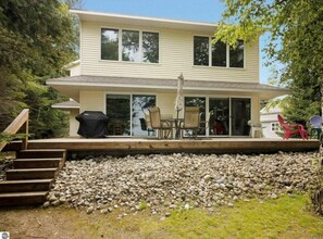 Outdoor dining - Charming 3 bed/bath home direct lake MI access and 10 min to Torch Lake (Ellsworth)