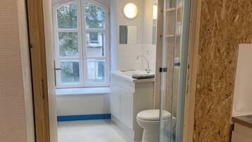 Shower, towels, toilet paper