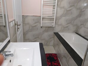 Hair dryer, towels, soap, shampoo