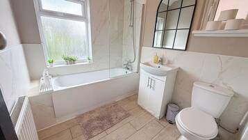 Hair dryer, towels, soap, shampoo