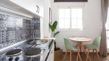 Premium Studio Suite | Individually decorated, individually furnished, blackout curtains