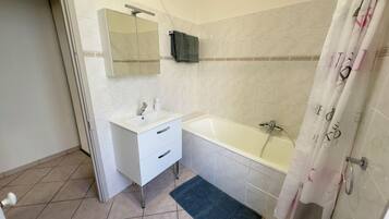 Hair dryer, towels, soap, shampoo