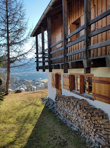 Charming 4BR chalet in Breil/Brigels with mountain view, WiFi & parking