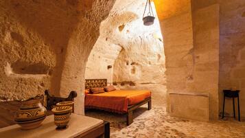 Enotrian Dwelling 6 - in a cave | Down comforters, individually decorated, individually furnished, desk