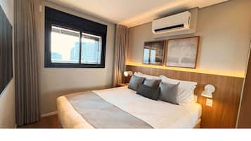 Premium bedding, blackout curtains, soundproofing, iron/ironing board