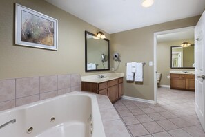 Jetted bath, hair dryer, towels, soap