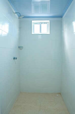 Comfort Double Room, Balcony, Bay View | Bathroom | Shower, towels, soap, toilet paper - SHAMAR LODGE  (Providencia)