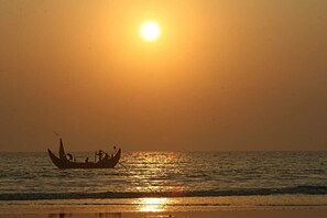 A boat on calm waters during sunset. - Nilanjana Kuakata (Kalapara)