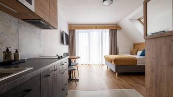 Junior-Suite | 1 Schlafzimmer, laptopgeeigneter Arbeitsplatz, kostenloses WLAN