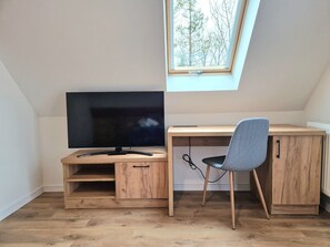 Apartamento Deluxe | Espacio para trabajar con un portátil, wifi gratis, ropa de cama