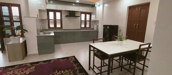 A two-bedroom home with a living room, kitchen, and garden feels like home.
