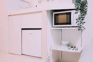 Appartement, 1 chambre, non-fumeurs | Coin cuisine privé | Mini réfrigérateur, micro-ondes, plaque de cuisson