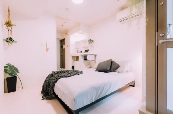 Appartement, 1 chambre, non-fumeurs | 1 chambre, bureau, fer et planche à repasser