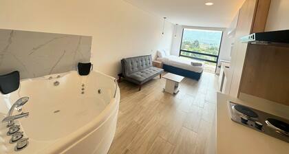 Apto con Jacuzzi Privado y vista verde