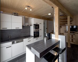 Private kitchen - Attractive Chalet With Whirlpool (Sankt Georgen am Kreischberg)