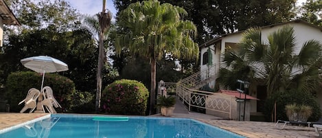 Outdoor pool, open 8:00 AM to 8:00 PM, pool umbrellas, sun loungers