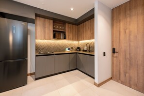 Fridge, microwave, stovetop, coffee/tea maker