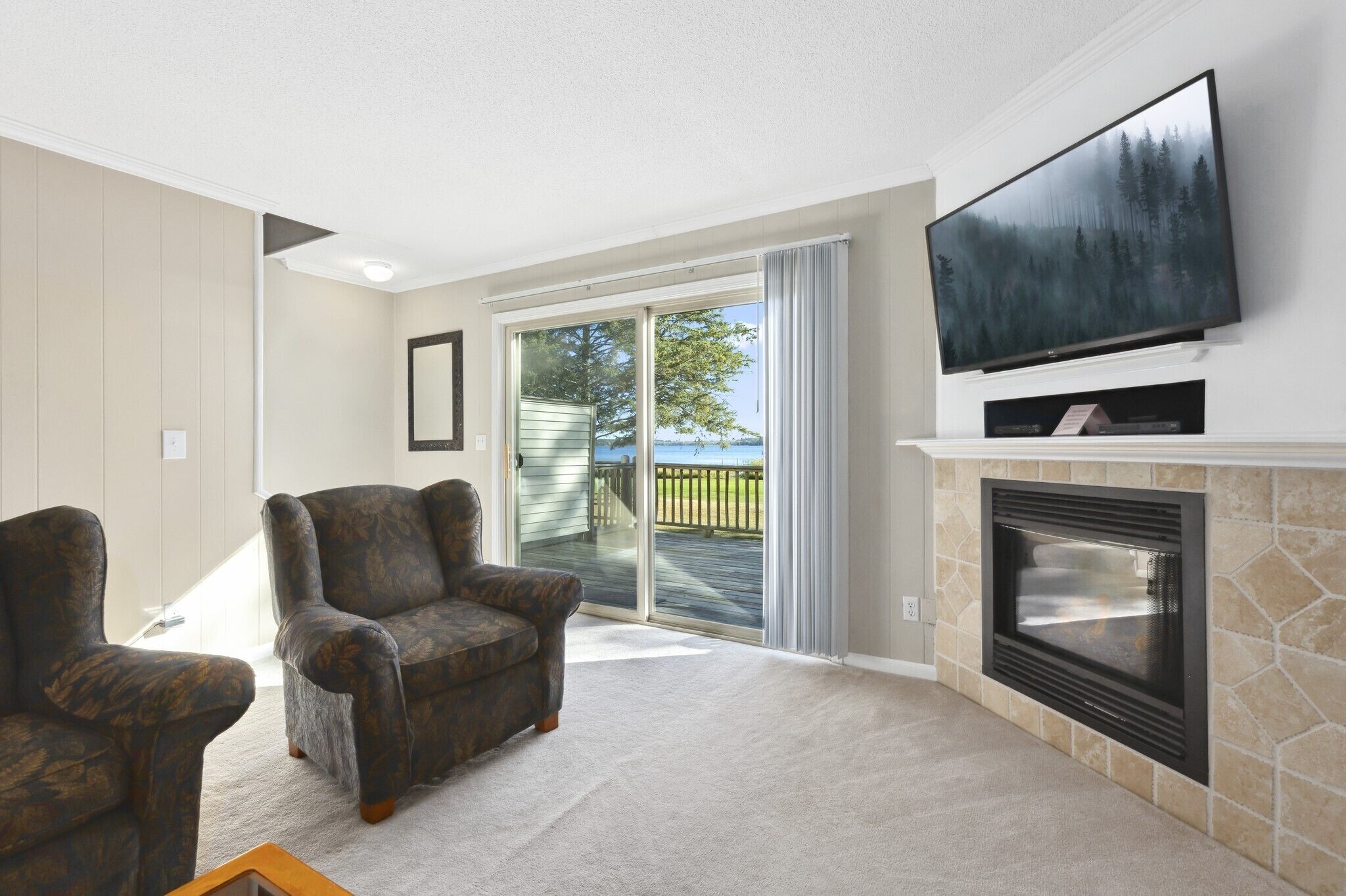 Family Townhome, Lake View | Living area | 35-inch flat-screen TV with cable channels, fireplace