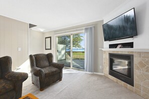 Family Townhome, Lake View | Living area | 35-inch flat-screen TV with cable channels, fireplace