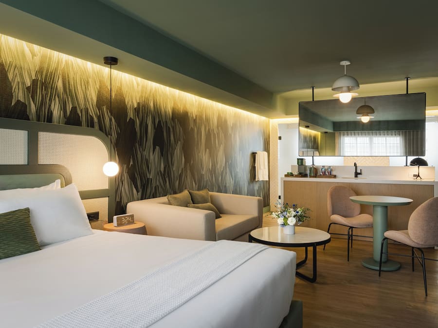 Deluxe Suite | Premium bedding, blackout drapes, iron/ironing board, free WiFi