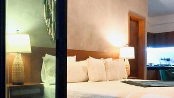 Premium bedding, minibar, blackout curtains, soundproofing