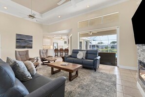 House, Multiple Beds, Pool Access (SHC1312) | Living area | Fireplace - 1312 sea Horse Court (Punta Gorda)