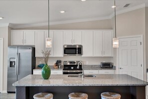 House, Multiple Beds, Balcony, Golf View (HLB14050-223) | Private kitchen | Fridge, microwave, oven, stovetop - 14050 Heritage Landing Blvd (Punta Gorda)