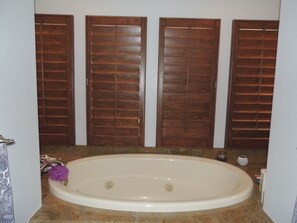 Shower, jetted bath, towels, soap