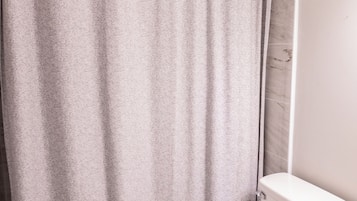 Jetted tub, hair dryer, towels, soap