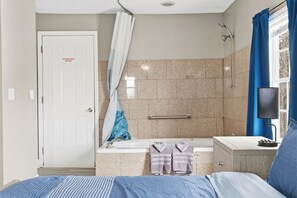 Jetted bath, hair dryer, towels, soap