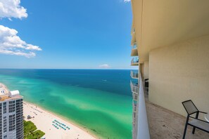 On the beach, sun loungers, beach towels