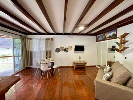 Family Villa, Balcony, Garden View | Living area | Flat-screen TV