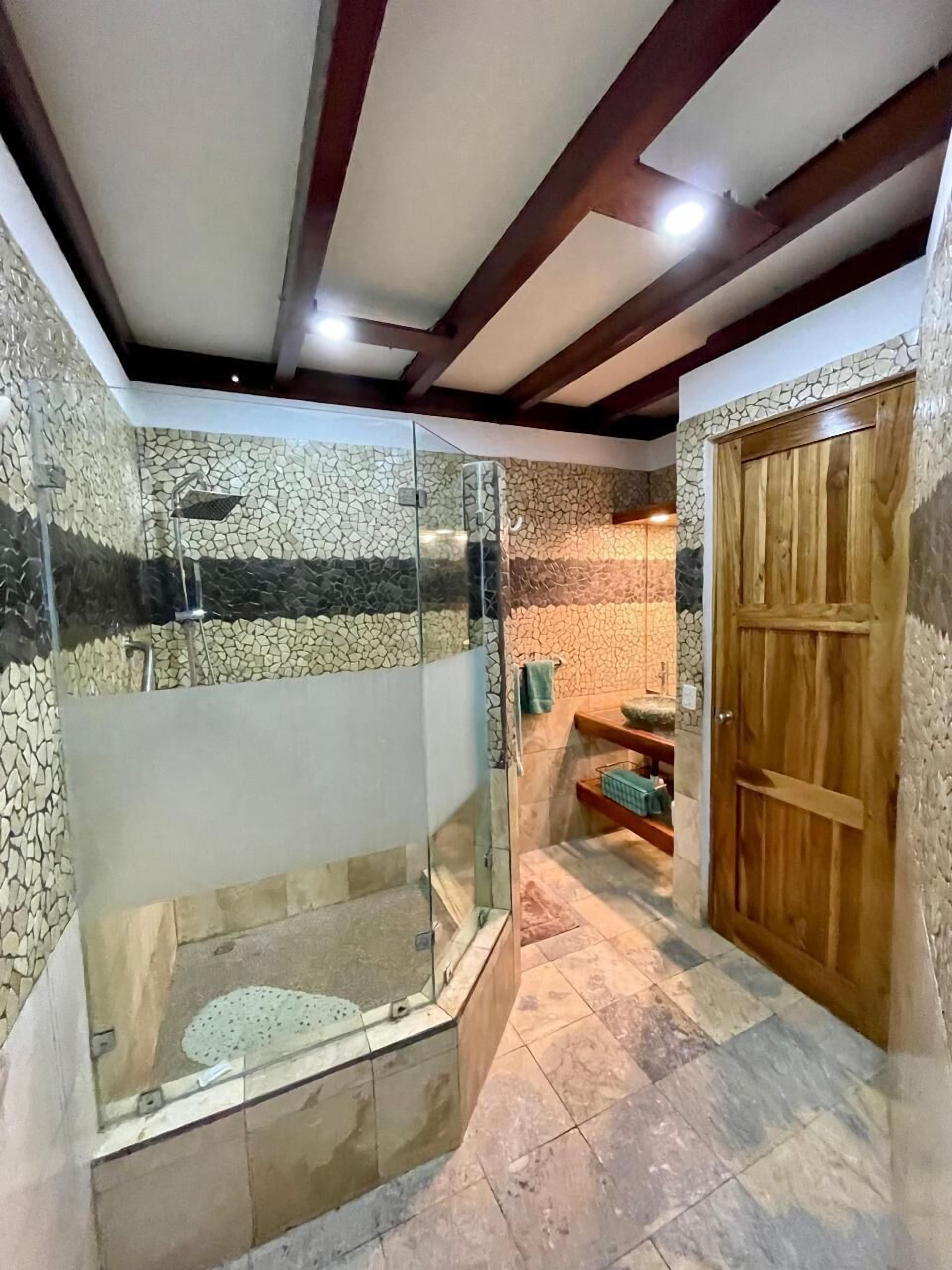 Shower, towels, soap, toilet paper