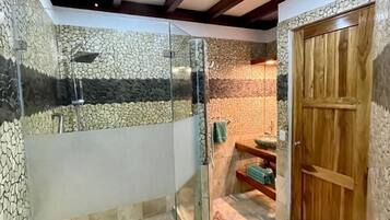 Shower, towels, soap, toilet paper