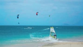 On the beach, sun loungers, beach towels
